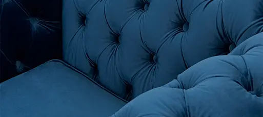 Blue velvet cheap studded sofa