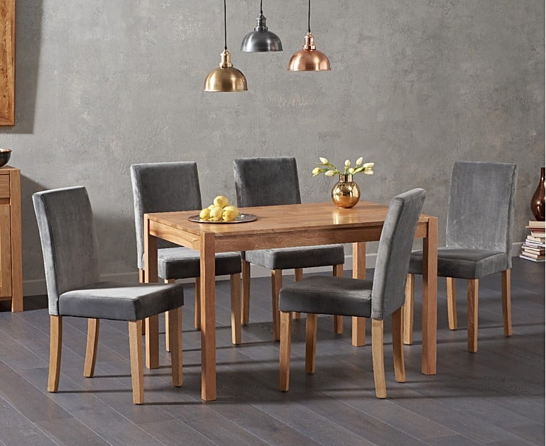 Seating up to 6 people along its 120cm length, the Oxford 120cm Solid Oak Dining Table with Mia ...